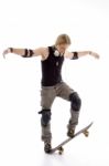 Adventure Man Balancing Skateboard Stock Photo