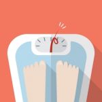 Overweight Bare Feet On Weight Scale Stock Photo