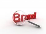 Brand Under Magnifying Glass Stock Photo