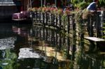 Reflections In Lake Hallstatt From An Adjacent Restaurant Stock Photo