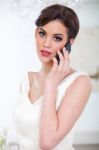 Beautiful Bride And Mobile Phone Stock Photo