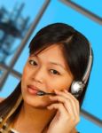Telephone Operator With Communications Tower Background Stock Photo