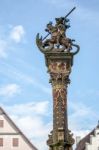 Statue On Top Of St. George's Fountain In Rothenburg Ob Der Taub Stock Photo
