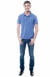 Full Length Portrait Of Young Guy In Casuals Stock Photo