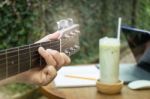 Relaxing Time With Classical Acoustic Guitar Stock Photo