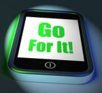 Go For It On Phone Displays Take Action Stock Photo