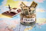 Travel Budget Concept With Compass, Passport And Aircraft Toy Stock Photo