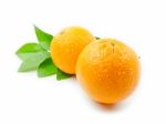 Oranges With Leaves Stock Photo