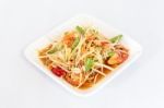 Thai Food Papaya Salad On White Dish Stock Photo