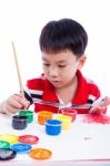 Asian Boy Draw Image Using Drawing Instruments, Creativity Concept Stock Photo