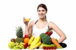Young Woman With Fruits And Glass Of Juice Stock Photo