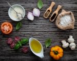 The Ingredients For Homemade Pizza On Shabby Wooden Background Stock Photo