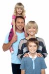 Portrait Of Happy Family Of Four Persons Stock Photo
