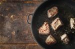 Fried Angus Beef In The Hot Pan Top View Stock Photo