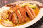 Roast Duck With Sauces Stock Photo