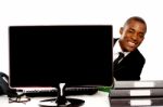 Businessman Peeping With Computer Stock Photo