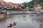 < Mixed People Canoeing Down The Vlatava River To Krumlov> Stock Photo