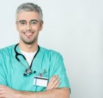 Smiling Middle Aged Physician Stock Photo
