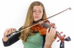 European Teenage Girl Playing Violin Stock Photo