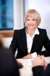 Businesswoman Working With Her Colleagues Stock Photo