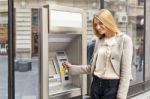 Woman Using Bank ATM Stock Photo