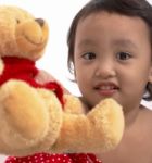 Girl With Her Teddy Stock Photo