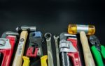 Working Tools On Black Background Stock Photo