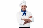 Smiling Male Chef Posing With Arms Crossed Stock Photo