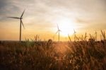Wind Turbines And Solar Morning Stock Photo