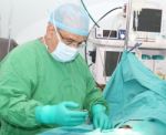 Doctor Starting A Surgery Stock Photo