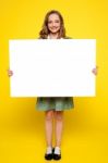 Girl Showing White Blank Board Stock Photo