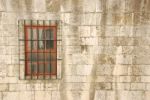 Window With Bars Of A Medieval Building Stock Photo