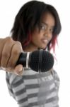 Young Girl Showing Microphone Stock Photo