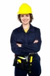 Confident Female Worker Posing With Arms Crossed Stock Photo