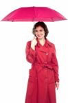 Young Fashionable Woman Holding An Umbrella Stock Photo