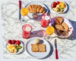 Set Table With Food And Drink For Breakfast Stock Photo