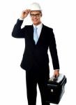 Smiling Architect Holding Briefcase Stock Photo