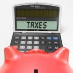 Taxes On Calculator Shows Hmrc Return Due Stock Photo