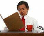 Office Worker Reading Report Stock Photo