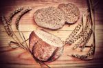 Fresh Bread On A Wooden Table Stock Photo