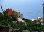 View Of The Alleys Of The Village Of Riomaggiore I Stock Photo