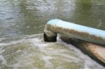 Waste Water Flow From Water Pipe Stock Photo