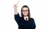 Schoolgirl Showing Pointing Upwards Stock Photo