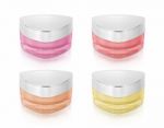 Warm Color Triangle Cosmetic Jar On White Background Stock Photo