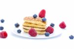 Pile Of Heart Shaped Pancakes With Blueberries And Raspberries Stock Photo