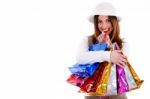 Young Lady Happy With Lot Of Shopping Bags Stock Photo