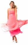Beautiful Young In Fluttering Party Dress Stock Photo