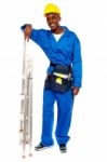 African Worker With Step Ladder Stock Photo