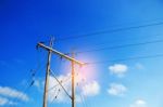 Electricity Poles With Blue Sky Stock Photo