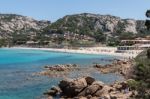 The Beach At Baja Sardinia Stock Photo